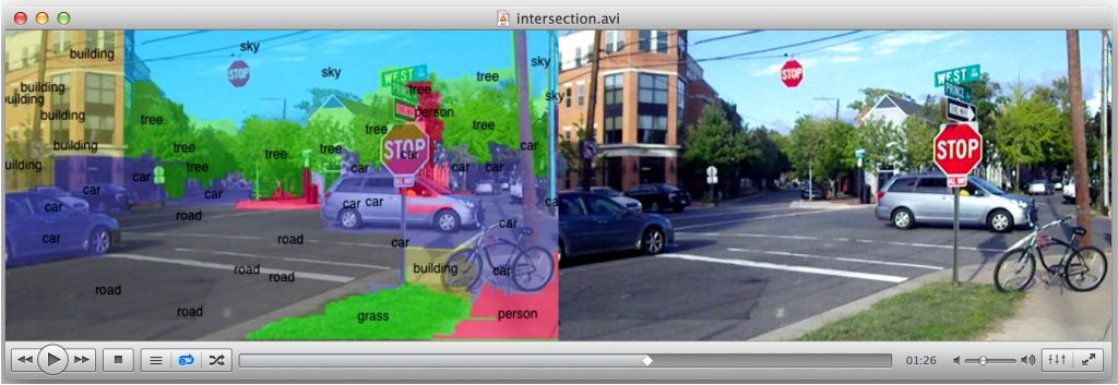 Researchers are working to enable smartphones and other mobile devices to understand and immediately identify objects in a camera's field of view, overlaying lines of text that describe items in the environment. Here, a street scene is labeled by the prototype, running up to 120 times faster than a conventional cell-phone processor. (Purdue University image/e-Lab)